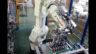 Roboter zur Verpackung von Portionsd&ouml;schen in Kartons