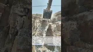 Rock & Roll Crisis: Watch This Excavator Dodge a Falling Boulder!