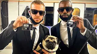 Men in Black on a Train.