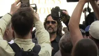 British comedian Russell Brand arrives at court to face rape charges | AFP