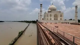 India: Rising floodwaters reach iconic Taj Mahal walls | AFP