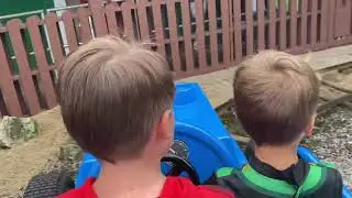 Riding the DUPLO Tractor Ride at Legoland Florida along with DUPLO Valley views