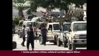 Militias & weapons caches remain obstacle to rebuilding Libya two years after Gadaffi