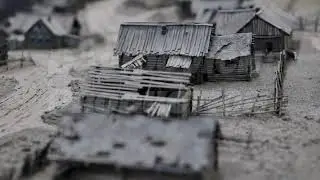 Miniature wooden houses showing a poor village in Eastern Europe