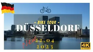 Exploring D&uuml;sseldorf's Stunning Promenade by Bike in April 2023 | 4K