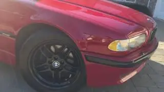 Imola Red BMW 740i Paint Correction Walk Around Sun Shot