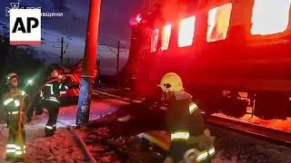 Carriages burn after deadly Russian drone attack on Ukraine passenger train