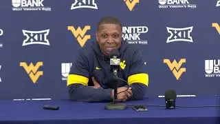 WVU RB's Coach Chad Scott talks to the media
