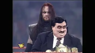 Paul Bearer begs the Undertaker to 