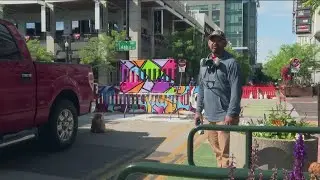 Barriers painted on 8th Street