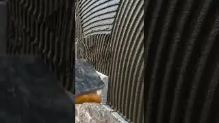 the process of installing small tiles on the wall #construction #wall #tiles #popular #shorts