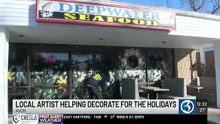 VIDEO: Local artist spreads holiday cheer through storefront window paintings