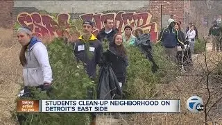 Kids help in neighborhood clean-up