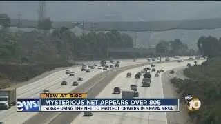 Mysterious cargo net hovering over Interstate 805 in Serra Mesa