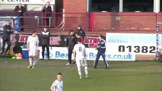Manager handball stops play at Dens!