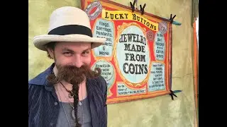 Lucky Buttons Jewelry showcasing some hand-cut, silver coin Pendants