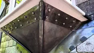 Upside down lead roofing on the Oriel Window.