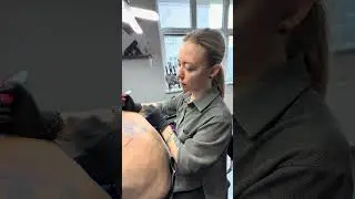 They draw tattoos on the skin with a machine