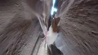 No Mans Canyon in Utah - Rappelling at the end of slot canyon
