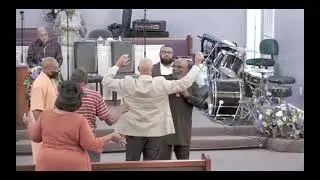 Apostle Joseph Hamilton Laying Hands On The Saints At Overcoming Church of Our Lord Jesus Christ