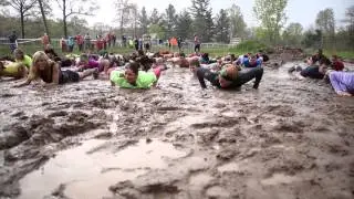 Watch Hero Mud Run participants roll in mud before taking off