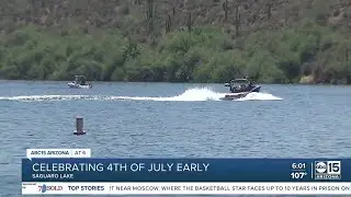 People celebrating 4th of July early at Saguaro Lake