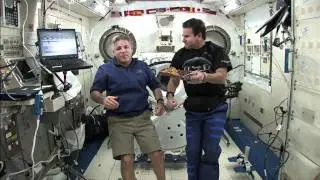 Shuttle Astronauts Play Chess