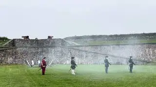 Louisbourg firing of the canon 12 pm sharp ￼ Sydney adventure tours Cape Breton Canada ￼