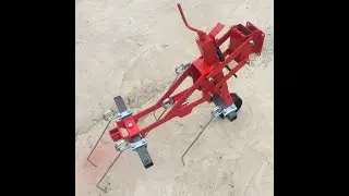 inter-row cultivator for 2 wheel tractor - with spring tines attached to it