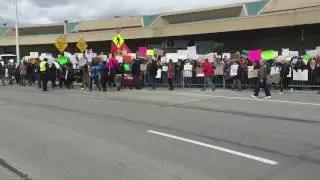 Protesters picket immigration ban at KCI