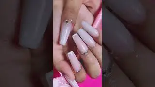 Elegant Coffin Nails: Ombr&eacute; Nude Pink & White with Rhinestone Accents.