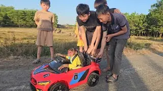 SU excitedly goes around showing off his new supercar