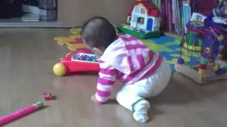 Chloe playing with the xylo toy