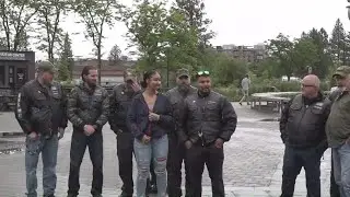 Woman honored for putting out American flag fire at protests