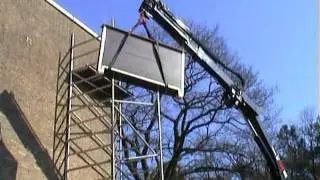 Mounting the bat house on the TWM building in Tilburg on March 2, 2004