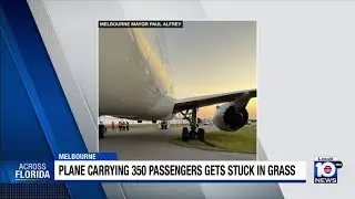 Plane gets stuck after traveling off runway at Florida airport