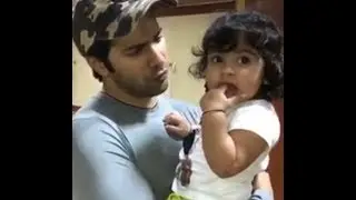 Varun Dhawan playing with cute baby