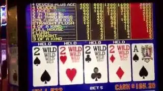 Video Poker: Four Deuces dealt, Ace drawn. 2000 credit jackpot