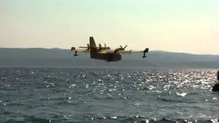 Fire rescue plane filling up with sea water - Croatia Pisak