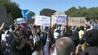 Moria fire: Migrants demonstrate against plans to move them to a new camp | AFP