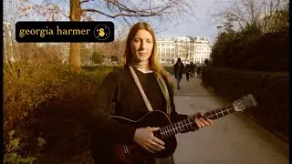 a portrait of georgia harmer in paris
