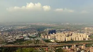 Greater Noida Aerial View of monsoon clouds, residential developments and expressway