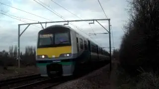Unbranded 321348 + 321364 passing Rochford foot crossing with tone