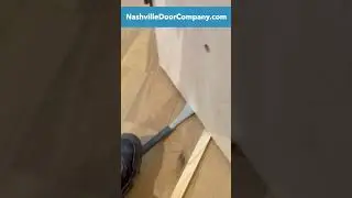 How to lift and hang a heavy door by yourself
