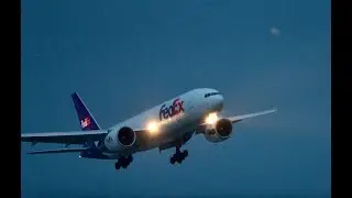 FEDEX seconds before touchdown, an inbound freighter adjusts its final approach at Anchorage AK