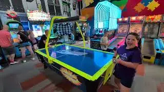 Addy and Kelvin play air hockey at Papio Fun Park 7-19-2025