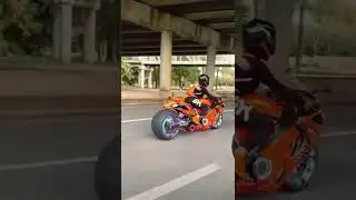 GIRL RIDING A SUZUKI HAYABUSA WITH EXTENDED SWING ARM