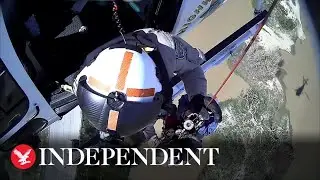 Stranded driver rescued by helicopter during California floods