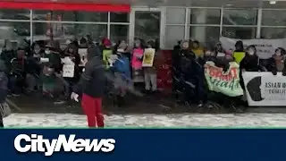 Protesters in Vancouver demand rights for migrant workers