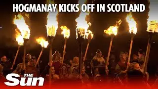 Hogmanay magic: Thousands of torches illuminate Edinburgh streets in NYE celebration